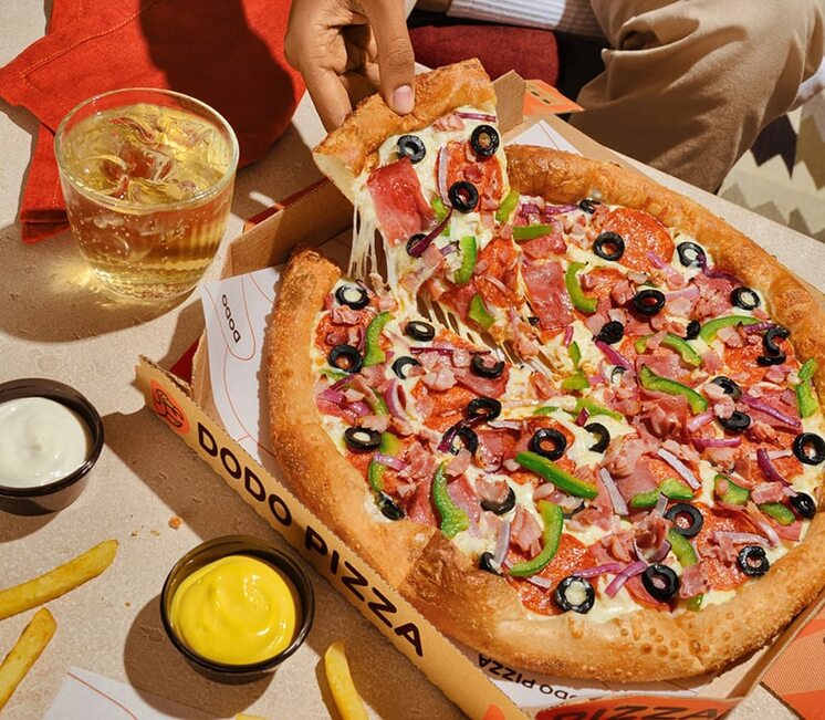 Pizza on picnic table